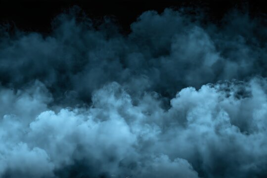 Thick blue smoke clouds rolling against a solid dark black background texture
