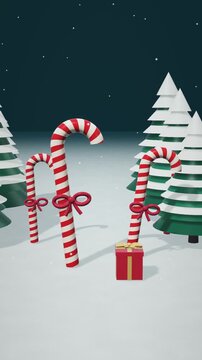 Candy Canes and Gift Box in Snowy Christmas Forest