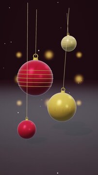 Red and Gold Christmas Baubles Hanging on Festive Background