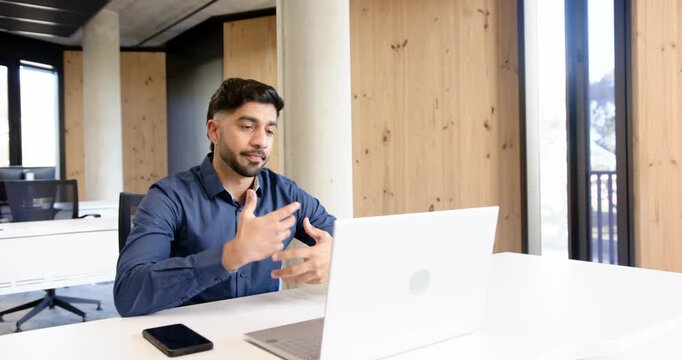 Lifestyle videos indoor of people doing activities at office, businessman in office having video con