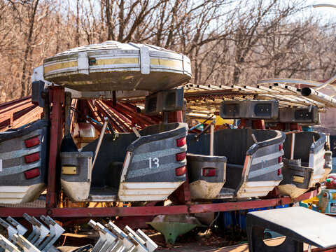 View of weathered carousel seats at the abandoned Yongma Land amusement park in Seoul, Seoul, South Korea.