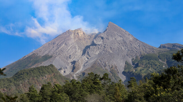 Beautiful morning landscape of Mount Merapi in Sleman, Yogyakarta, Indonesia, featuring a scenic mountain view, fresh atmosphere, natural surroundings, and peaceful countryside scenery.