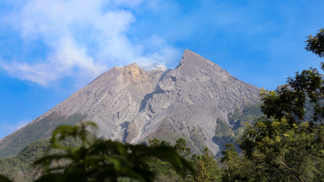 Beautiful morning landscape of Mount Merapi in Sleman, Yogyakarta, Indonesia, featuring a scenic mountain view, fresh atmosphere, natural surroundings, and peaceful countryside scenery.