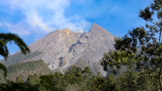Beautiful morning landscape of Mount Merapi in Sleman, Yogyakarta, Indonesia, featuring a scenic mountain view, fresh atmosphere, natural surroundings, and peaceful countryside scenery.