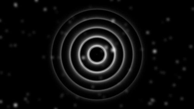 Concentric circles animation glows with soft bokeh lights. Radiant abstract target rings expand in concentric circles. Modern optic graphic design visuals fill concentric circles.