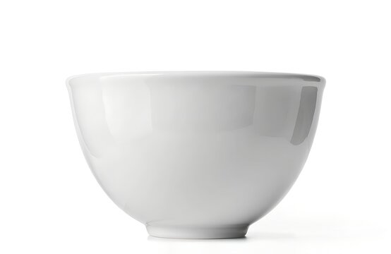 Simple clean white ceramic bowl isolated on a bright background with kitchenware