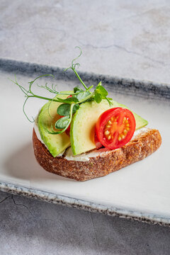 Delightful open-faced sandwich with fresh toppings and artisan bread