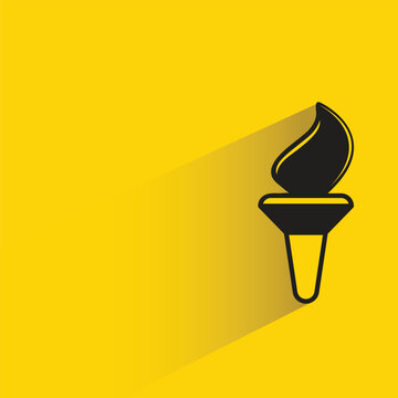 fire torch icon with shadow on yellow background
