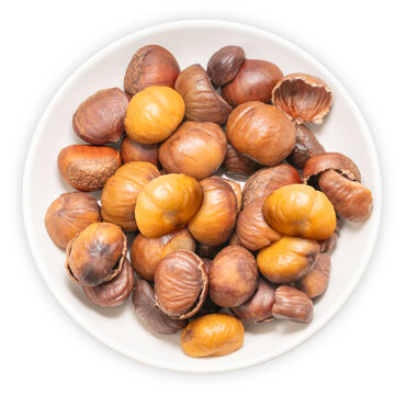 Freshly roasted chestnuts with cracked shells isolated on a white background, with clipping path, Perfect visual for healthy snack marketing, gourmet food recipes.