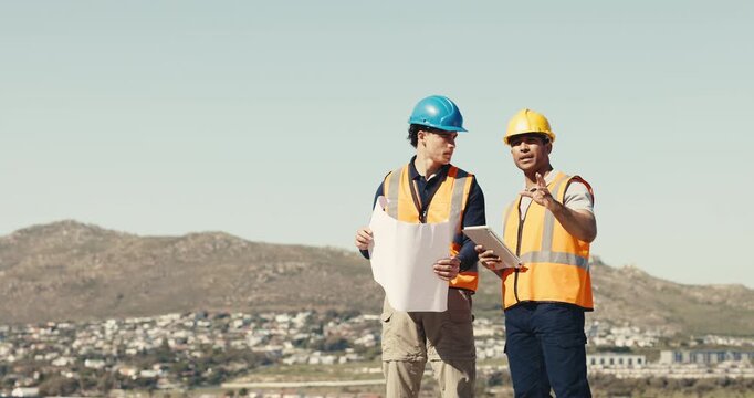 Men, quality control and inspection on construction site with tablet, discussion or project. Electrician, digital tech and people with space and blueprint for engineer, meeting or safety compliance