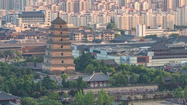 Ancient Chinese Pagoda Surrounded by Modern City Skyline in Xi'an, China
