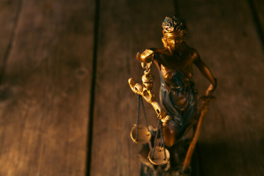 Law and Justice concept. Statue of justice with scales of justice.