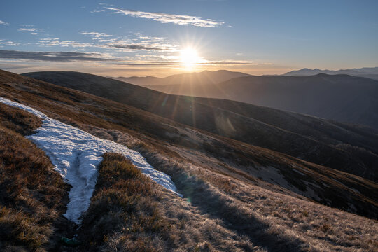 Spring landscape with beautiful mountains hills in sunny lights