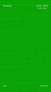Green replacement screen features pixelated rewind, stop tape, timer worn VHS texture. chroma key composites, retro footage, camcorder scene recording, media playback, horror edit nostalgic project