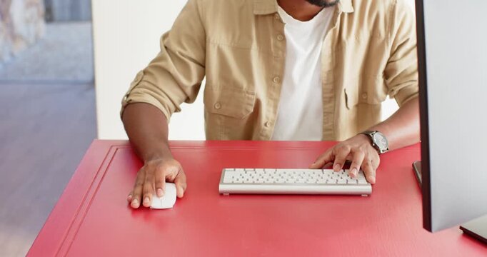 Lifestyle videos indoor of people doing activities at home, typing on keyboard, man working from hom