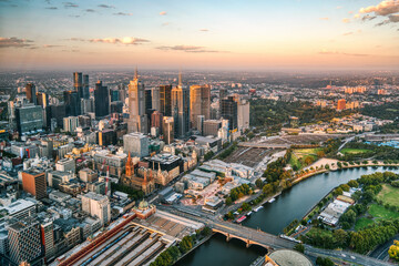 Aerial View of Melbourne CBD and Yarra River at Sunset © romanslavik.com