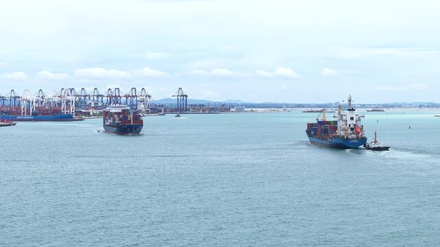 Large container ships sailing in a busy seaport terminal with massive gantry cranes and cargo. Global maritime logistics, international shipping trade, and industrial freight transport operations.
