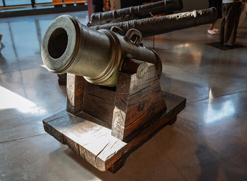 Ancient 18th century naval bomb vessel cannon on a wooden carriage.