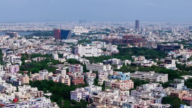 under construction NIMS New Extended Building with residential buildings, Pranava's One building and PVR IRRUM MANZIL at hyderabad, telangana, india. day time, push in shot, drone shot, 4k.