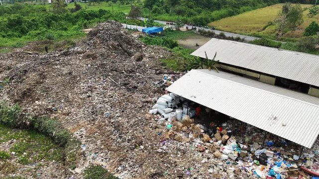 Large piles of waste accumulate along the Jingah River bank in Banjarmasin South Kalimantan