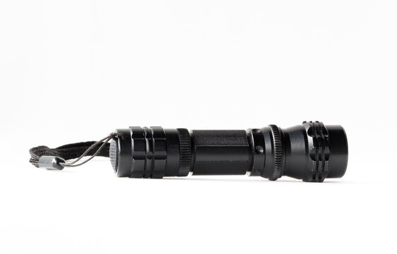 LED flashlight for hiking at night on white background.