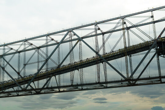 Industrial Steel Structure of the F60 Overburden Conveyor Bridge Against Cloudy Sky