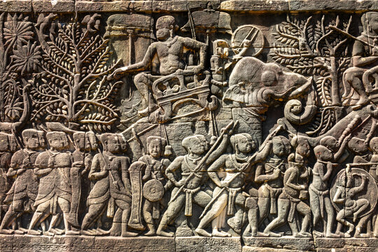 Detail of bas-relief stone carvings in Bayon temple in Angkor, Siem Reap, Cambodia