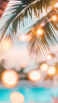 Palm tree leaves with bokeh lights, perfect for tropical holiday background