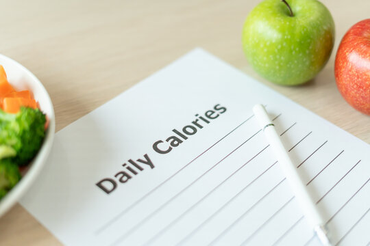 Diet and dieting. Beauty slim female body writing diet plan for healthy food. weight loss, lose, balance, control, reduce fat, low calories, routines, exercise.