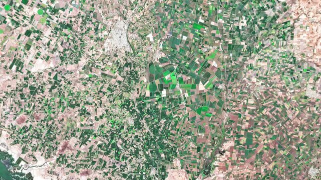 Aerial view of the coastal agricultural landscape of Sinaloa, Mexico, illustrating the relationship between farmland, rural settlements and the Pacific coast