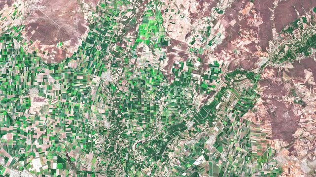 Aerial view of the coastal agricultural landscape of Sinaloa, Mexico, illustrating the relationship between farmland, rural settlements and the Pacific coast