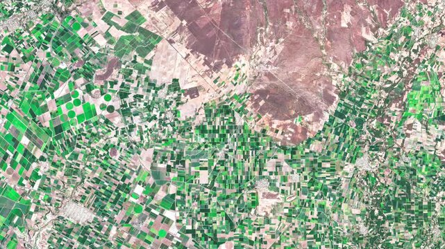 Aerial view of the coastal agricultural landscape of Sinaloa, Mexico, illustrating the relationship between farmland, rural settlements and the Pacific coast