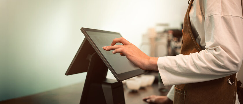 Cafe Barista Using Touchscreen POS System at a Coffee Shop Counter, Showing a Caucasian Woman Managing Digital Orders in a Modern Small Business Workspace With Copy Space