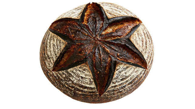Isolated freshly baked artisanal sourdough bread loaf with a perfectly scored star pattern