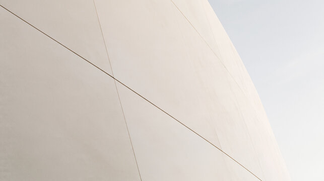 Minimalist Modern Architecture Facade with Curved Concrete Geometry