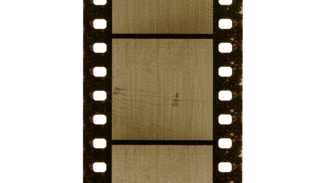 Vintage film strip with perforations and scratches, isolated on transparent background