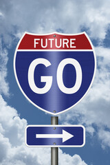 Go Future text on an American interstate road sign with sky for next steps © Karen Roach