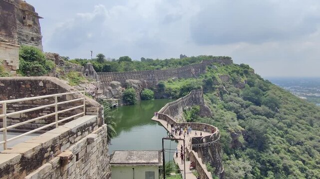 Chittorgarh, Rajasthan, India 15 September 2026: Footage of Crowd at Gaumukh Kund in Chittorgarh Fort shot against a beautiful sky during daylight