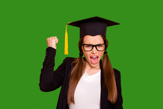 Close up photo of ecstatic delighted teen teenager raise fist hands scream yeah achieve finish white pullover tails black jacket yellow background