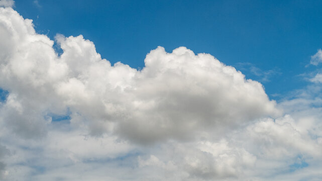 Blue sky landscape nature. Tropical summer blue sky fluffy white cloud summertime sunlight sunny day cloudscape. Cumulus cloudscape air climate. Blue sky white clouds summer season bright skyline