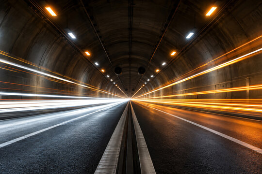 Road tunnel with speeding light trails perspective