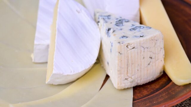 cheese mix featuring Parmesan, Brie, blue cheese, and Camembert.