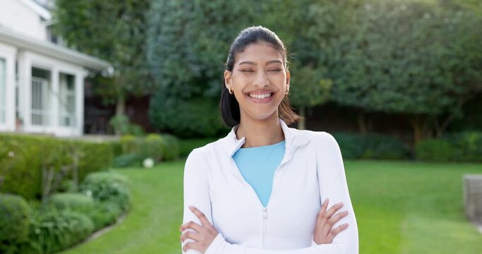 Arms crossed, fitness and smile of woman in neighborhood for commitment or dedication to cardio. Exercise, happy and proud with runner outdoor in residential community for health training or workout