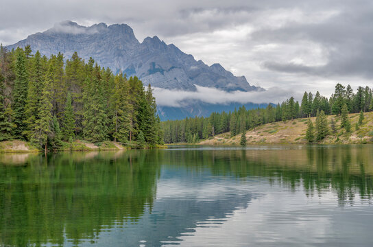 Cloud covering Cascade Mountain and Johnson Lake in Banff National Park, Alberta, Canada