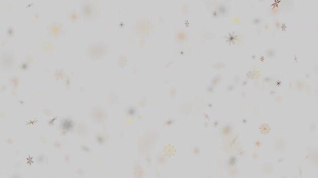 Elegant gold and black snowflakes falling on light grey background