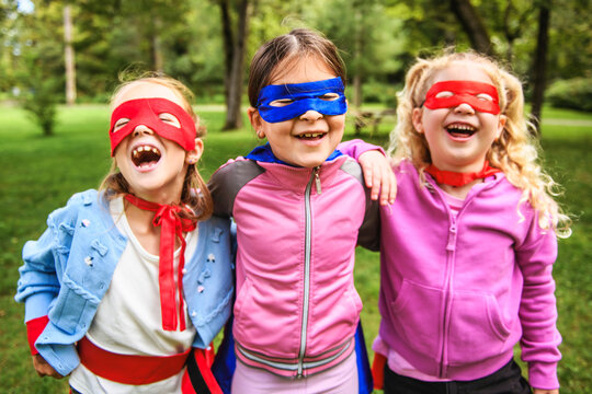 Group kids friends Superhero playing togetherness and having fun outdoor