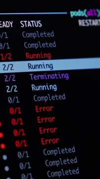 Computer screen displaying Kubernetes cluster pod status with running, completed, terminating, and error states, illustrating cloud computing infrastructure monitoring. Vertical