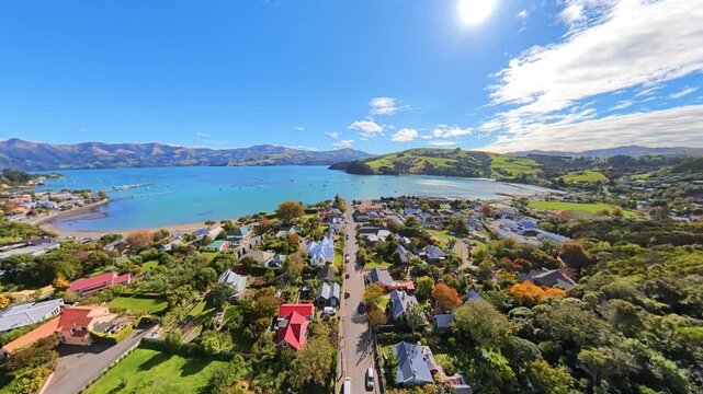Overlooking the green hills and the coastal town, Akaroa, New Zealand