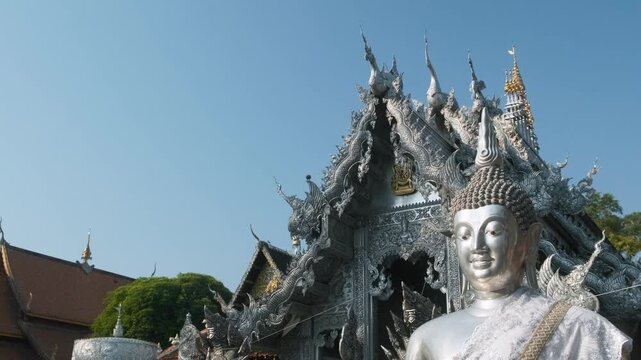 Silver Buddha statue at Wat Sri Suphan, the Silver Temple of Chiang Mai city, Thailand. Buddhism, Thai religious architecture and art, Lanna craftsmanship, cultural heritage and temple tourism