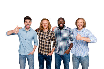 Obraz premium Portrait of four nice attractive glad cheerful cheery guys best buddy support trust showing thumbup cool advice isolated over gray purple pastel color background